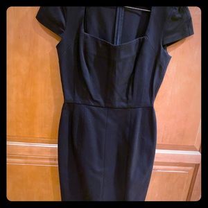 Never worn lovely black sheath dress